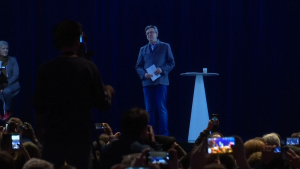 3D hologram speaker presenting during a live event.